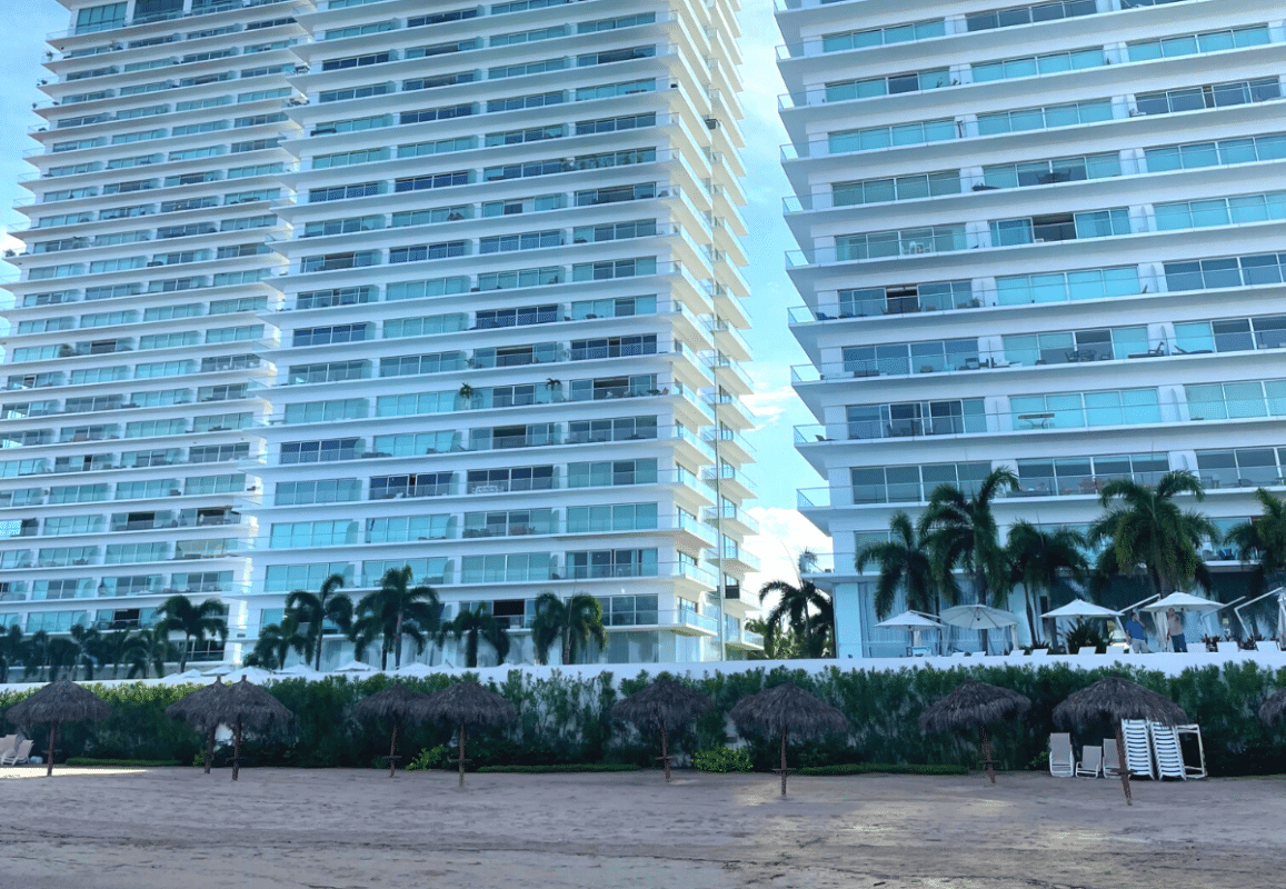 Three tall hotels on the beach in Puerto Vallarta, Mexico.