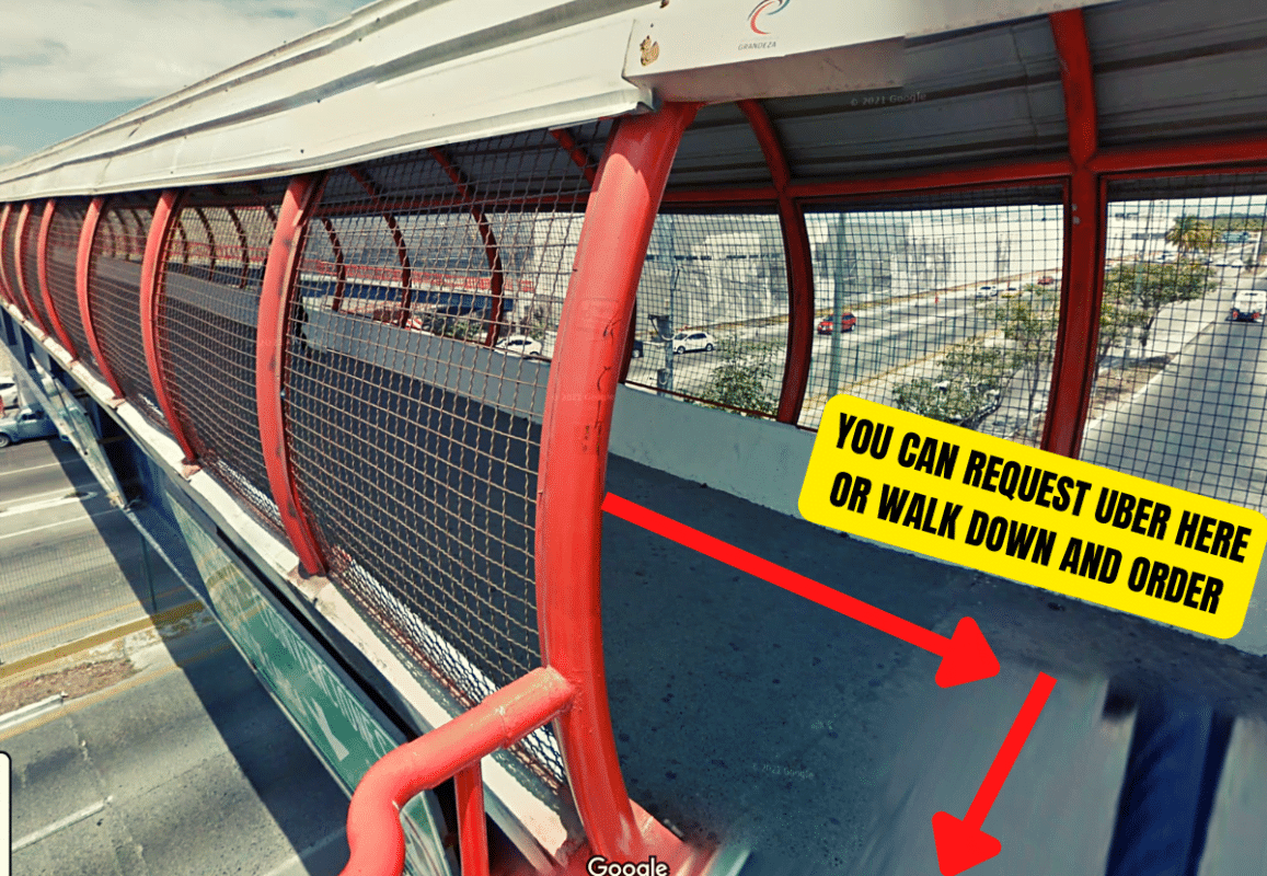 After crossing the bridge, waiting above the Uber zone.