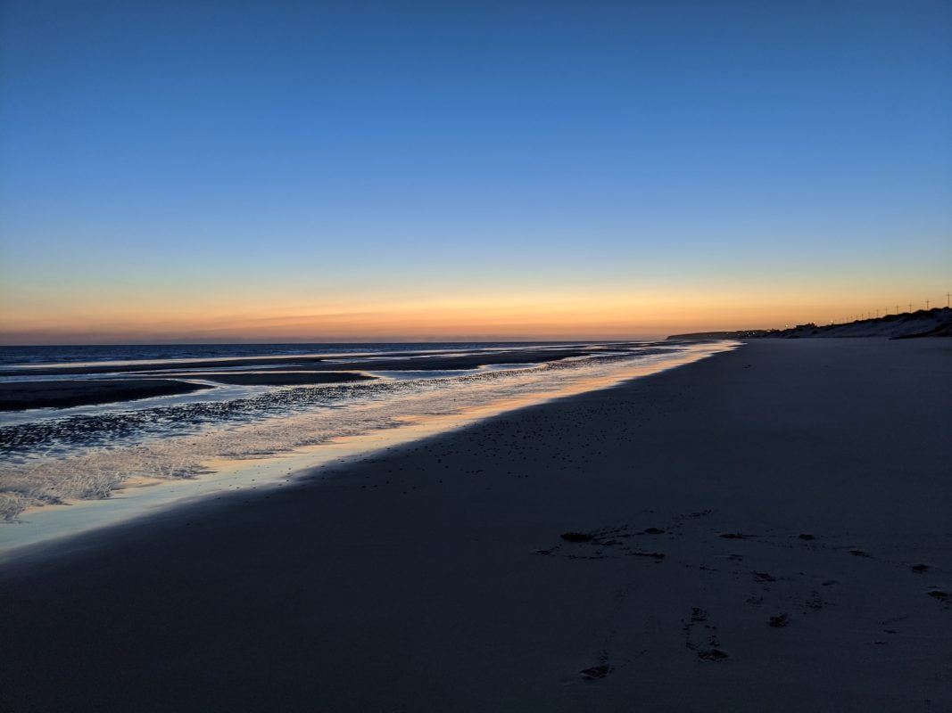 san felipe hotel beach at sunset with footprints in the sand