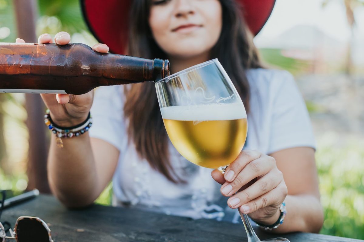 girl pouring craft beer in Mamut Brewery,Tijuana, Mexico
