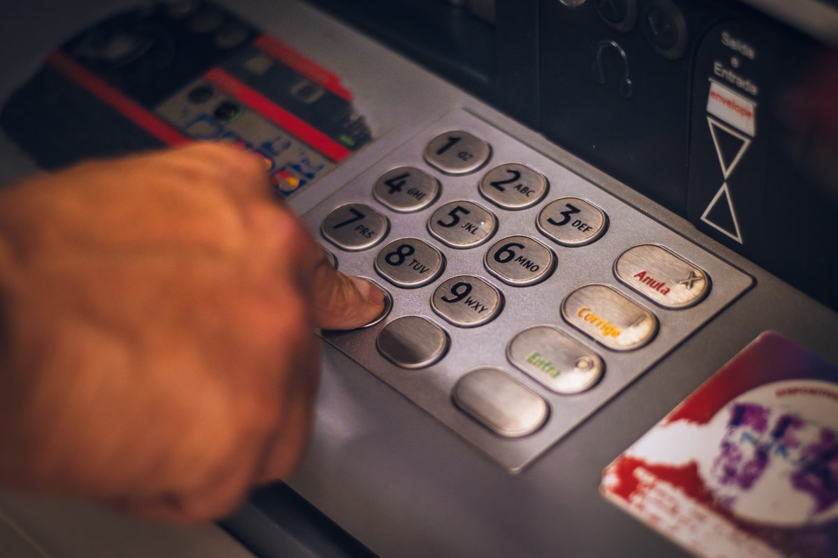 tourist using a ATM in Tijuana