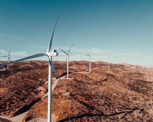 white wind turbine on brown field, La Rumorosa, Mexico